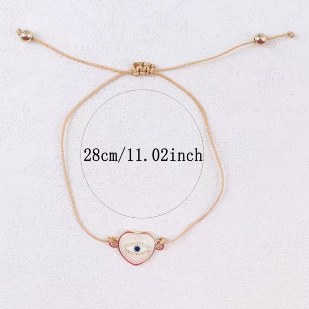 Gold and Pearlized Heart Evil Eye Adjustable Rope Bracelet - Picture 3 of 3